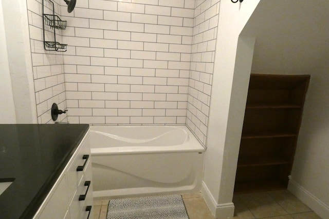 552 W Main St, Niles, MI 49120 - bathroom with vanity, tile patterned flooring, and tub / shower combination