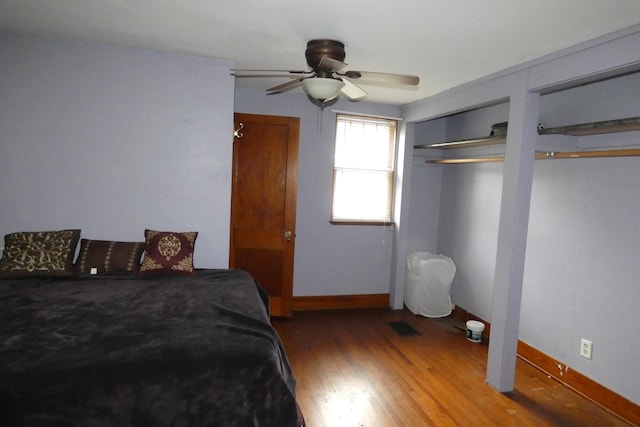 552 W Main St, Niles, MI 49120 - bedroom with wood finished floors, two closets, and ceiling fan