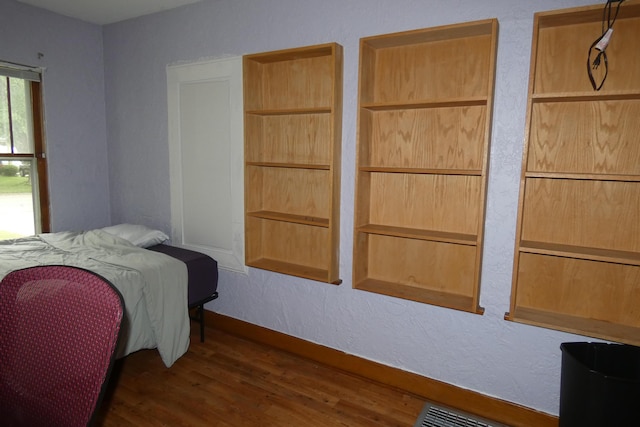 552 W Main St, Niles, MI 49120 - bedroom featuring wood finished floors and baseboards