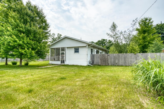 8182 Hardy Dr, Newaygo, MI 49337 - view of yard with a sunroom