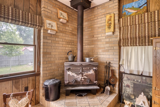 8182 Hardy Dr, Newaygo, MI 49337 - detailed view of a wood stove and brick wall