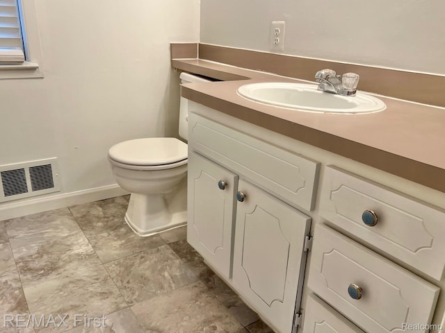 256 Withington St, Ferndale, MI 48220 - bathroom featuring toilet and vanity