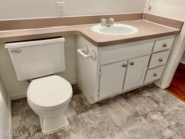 256 Withington St, Ferndale, MI 48220 - half bathroom with toilet and vanity