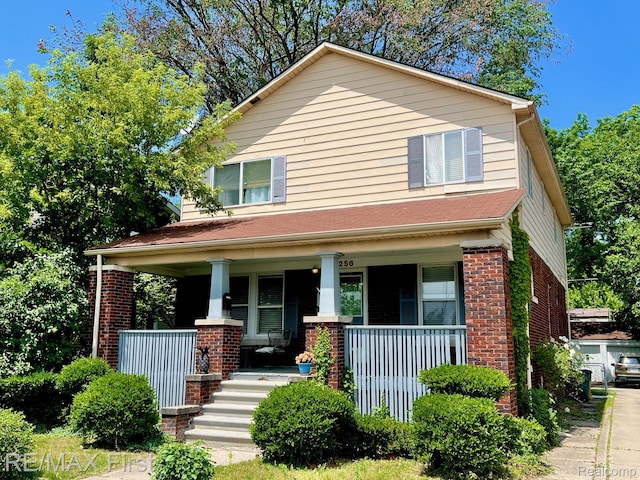 256 Withington St, Ferndale, MI 48220 - view of front of property featuring covered porch and brick siding
