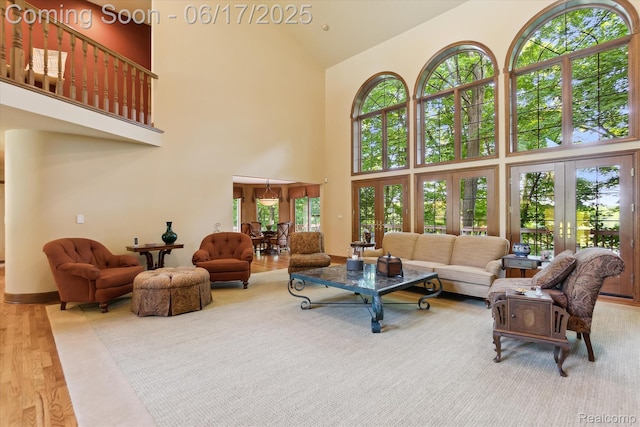 2020 Pine Hollow Trl, Brighton, MI 48114 - living room with high vaulted ceiling and french doors