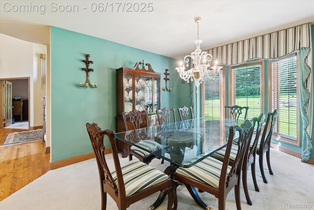 2020 Pine Hollow Trl, Brighton, MI 48114 - dining room with a chandelier and light wood-type flooring