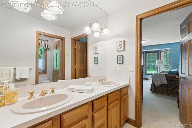 2020 Pine Hollow Trl, Brighton, MI 48114 - full bathroom featuring double vanity and ensuite bathroom