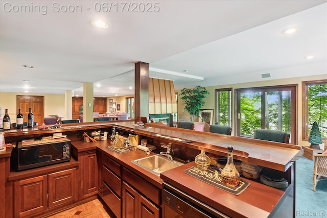 2020 Pine Hollow Trl, Brighton, MI 48114 - kitchen featuring black microwave, open floor plan, recessed lighting, and dark countertops