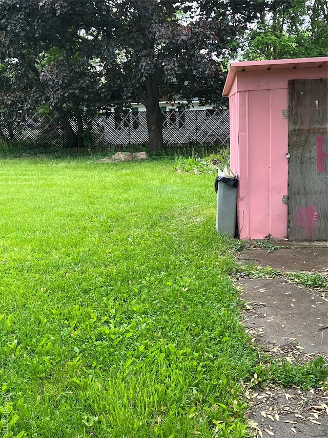 4172 Fenton Rd, Flint, MI 48507 - view of yard with a storage shed