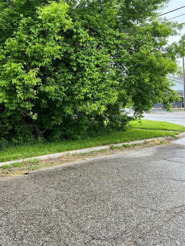 4172 Fenton Rd, Flint, MI 48507 - view of asphalt street featuring sidewalks