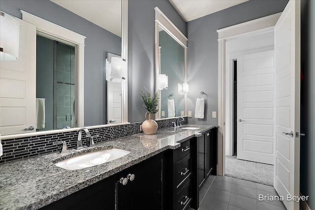 335 Bridge St NW Unit 3102, Grand Rapids, MI 49504 - full bath with double vanity, tile patterned floors, and tasteful backsplash