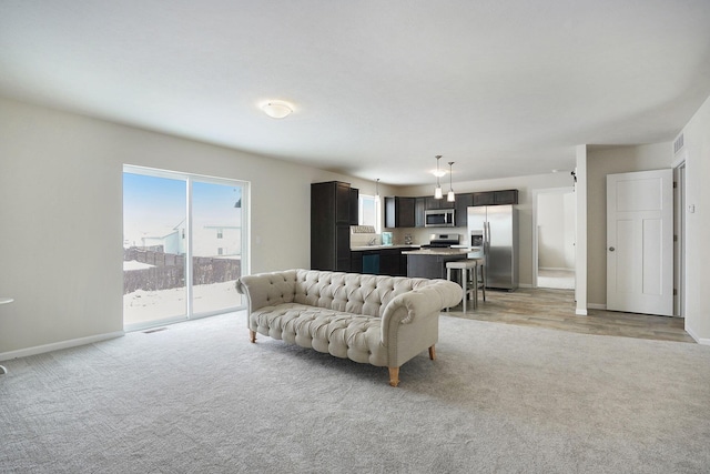 LOT106 Butternut Dr, Wayland, MI 49348 - living room featuring light carpet and baseboards