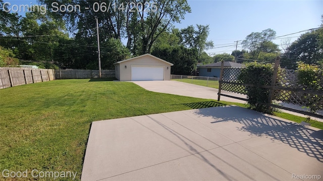 8544 Russell St, Shelby Twp, MI 48317 - fenced backyard with a garage, an outdoor structure, and a patio