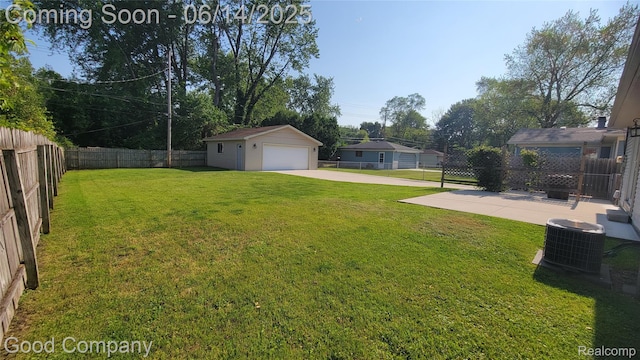 8544 Russell St, Shelby Twp, MI 48317 - fenced backyard featuring a garage and an outbuilding
