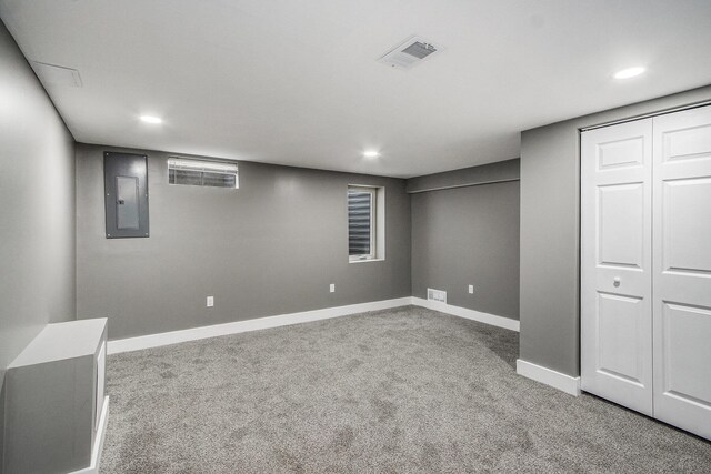 6737 Cypress St, Portage, MI 49024 - finished below grade area featuring electric panel, carpet floors, and recessed lighting