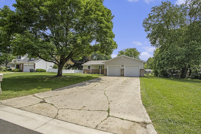 6737 Cypress St, Portage, MI 49024 - view of front of property featuring brick siding, concrete driveway, and a garage