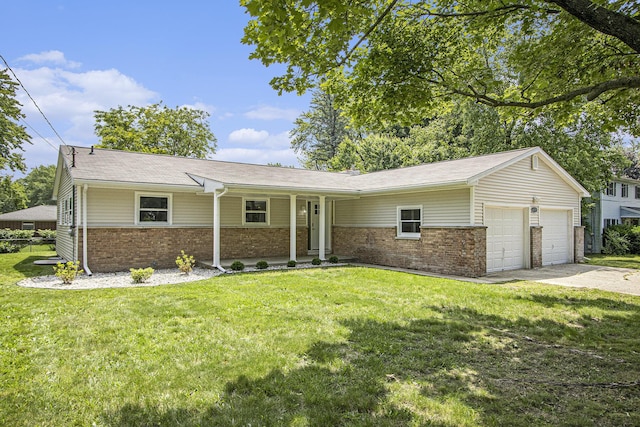6737 Cypress St, Portage, MI 49024 - ranch-style house featuring brick siding, an attached garage, a front yard, driveway, and a porch
