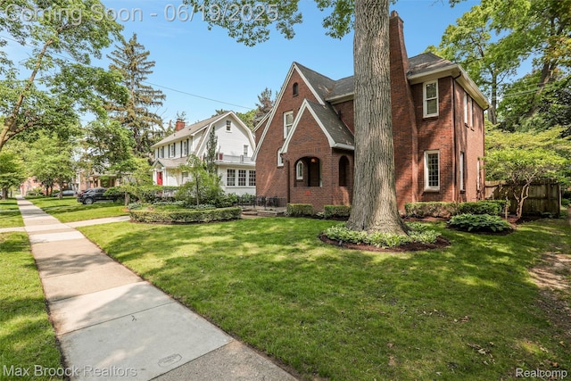 11 Sylvan Ave, Pleasant Ridge, MI 48069 - tudor house with brick siding and a chimney