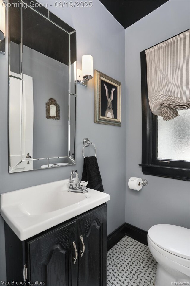 11 Sylvan Ave, Pleasant Ridge, MI 48069 - bathroom featuring vanity and toilet