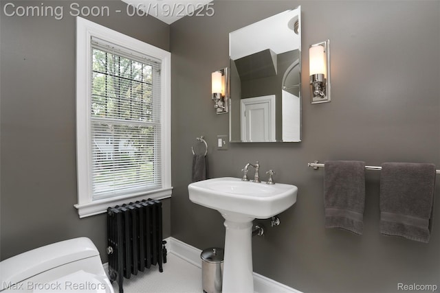 11 Sylvan Ave, Pleasant Ridge, MI 48069 - bathroom featuring radiator and toilet