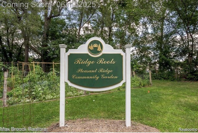 11 Sylvan Ave, Pleasant Ridge, MI 48069 - community sign with a yard and view of wooded area