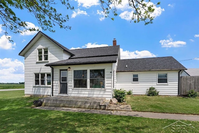 490 W Wilder Rd, Auburn, MI 48611 - view of front of property with a chimney and roof with shingles
