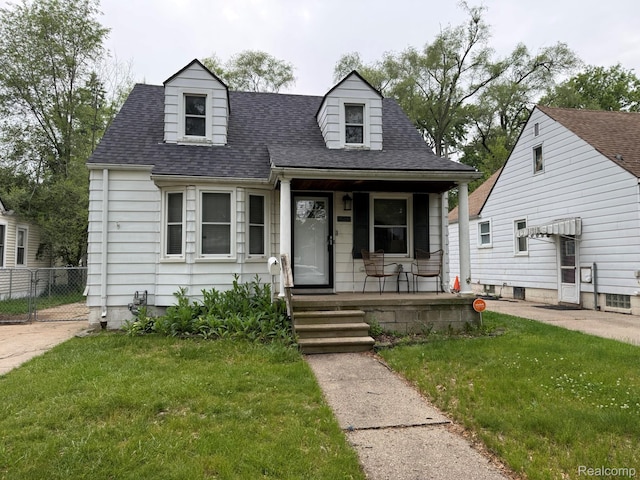 11311 Tecumseh, Redford, MI 48239 - cape cod home featuring a porch and roof with shingles