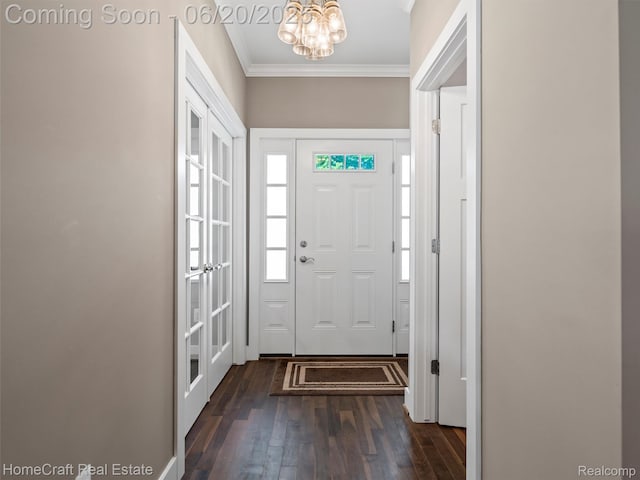 2213 Beverly Blvd, Berkley, MI 48072 - entrance foyer featuring crown molding, a chandelier, and dark wood-style flooring