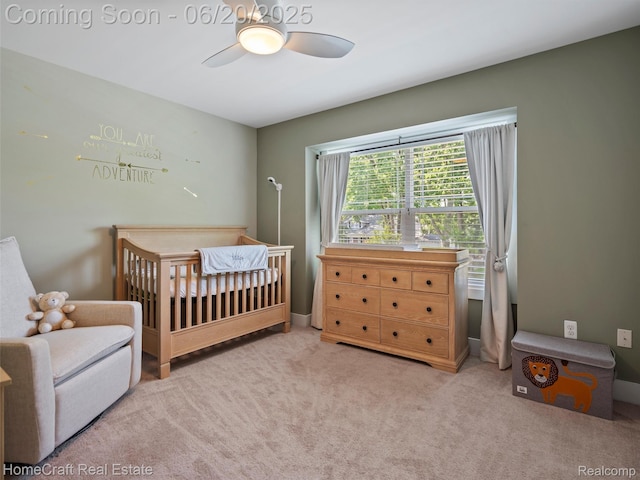 2213 Beverly Blvd, Berkley, MI 48072 - carpeted bedroom with a crib and ceiling fan