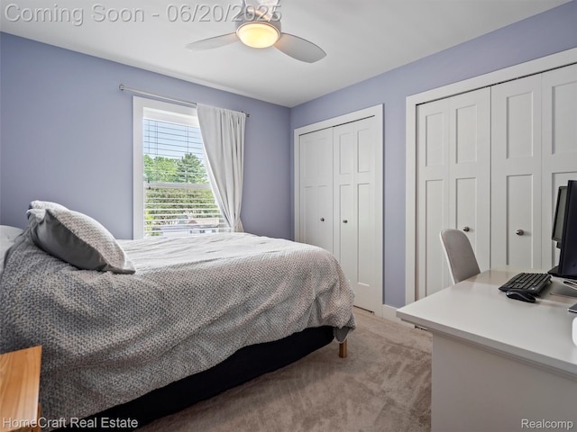 2213 Beverly Blvd, Berkley, MI 48072 - bedroom with light carpet, two closets, a ceiling fan, and an office area