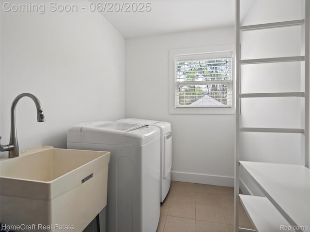 2213 Beverly Blvd, Berkley, MI 48072 - washroom featuring washing machine and dryer and light tile patterned floors
