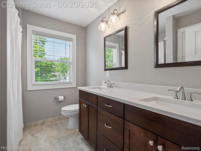 2213 Beverly Blvd, Berkley, MI 48072 - bathroom featuring marble look tile flooring and double vanity