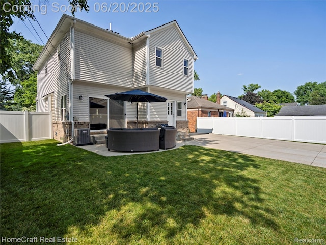2213 Beverly Blvd, Berkley, MI 48072 - rear view of house with brick siding, a patio, a fenced backyard, and outdoor lounge area