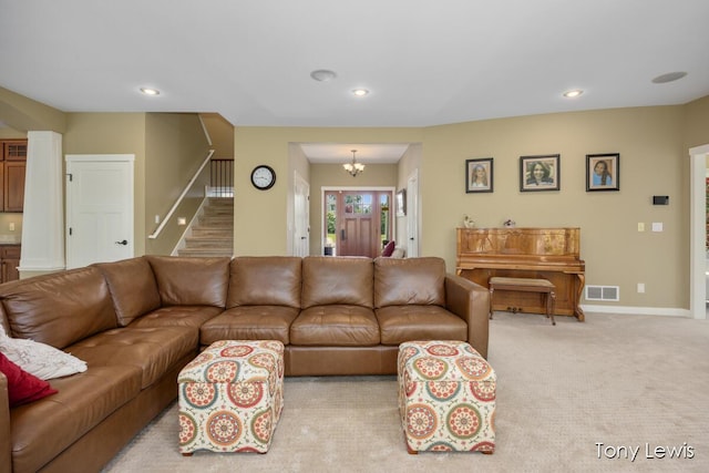 2331 Deer Trail Dr NE, Grand Rapids, MI 49505 - living area with stairs, recessed lighting, carpet flooring, and a chandelier