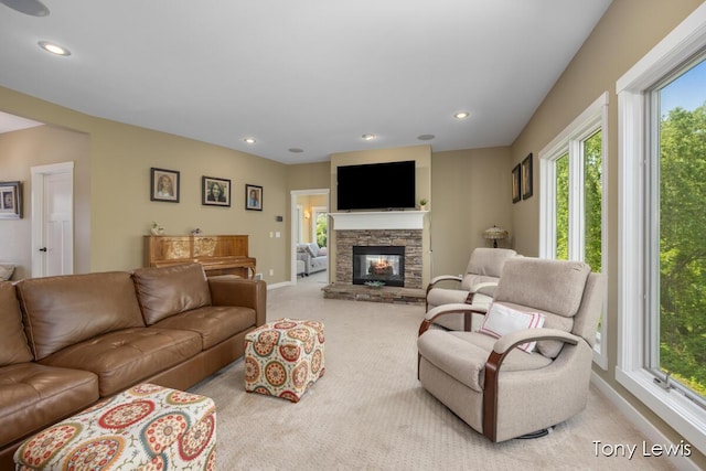 2331 Deer Trail Dr NE, Grand Rapids, MI 49505 - living area with light carpet, recessed lighting, and a fireplace