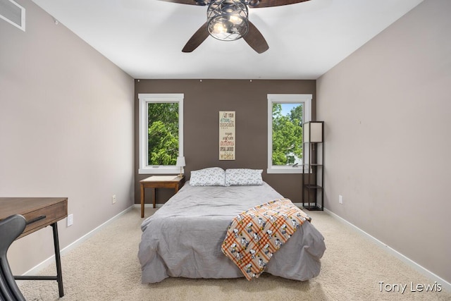 2331 Deer Trail Dr NE, Grand Rapids, MI 49505 - carpeted bedroom with baseboards and ceiling fan
