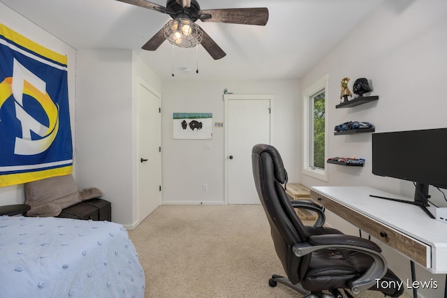 2331 Deer Trail Dr NE, Grand Rapids, MI 49505 - bedroom with carpet, an office area, and a ceiling fan