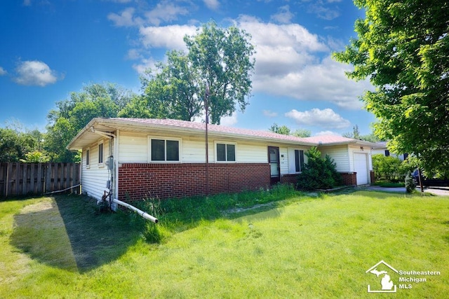 6200 Jackman Rd, Temperance, MI 48182 - ranch-style home featuring brick siding and an attached garage