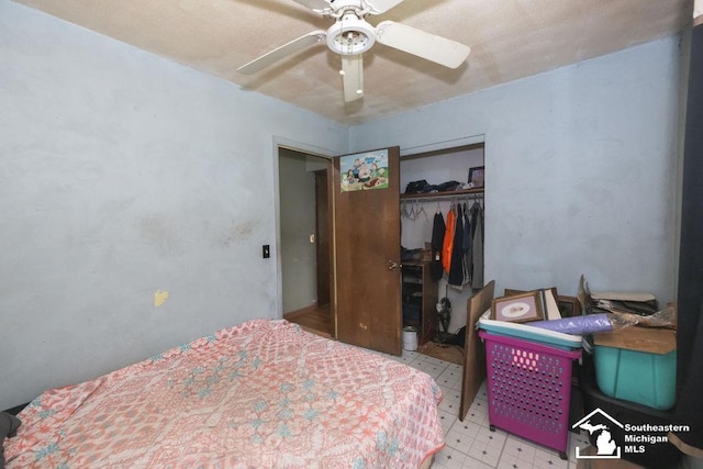 6200 Jackman Rd, Temperance, MI 48182 - bedroom with tile patterned floors, a closet, and a ceiling fan