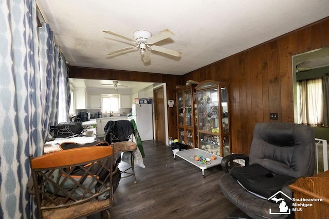 6200 Jackman Rd, Temperance, MI 48182 - office area with ceiling fan, wood walls, and dark wood-type flooring