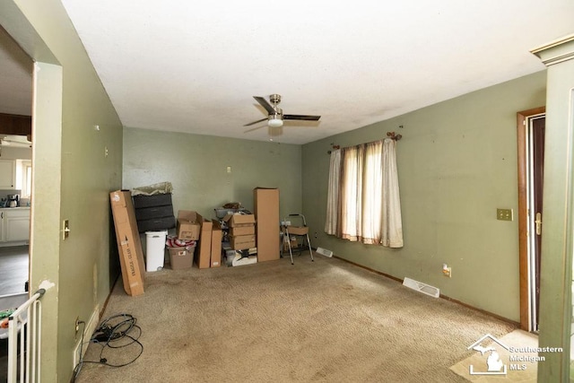 6200 Jackman Rd, Temperance, MI 48182 - carpeted empty room with ceiling fan