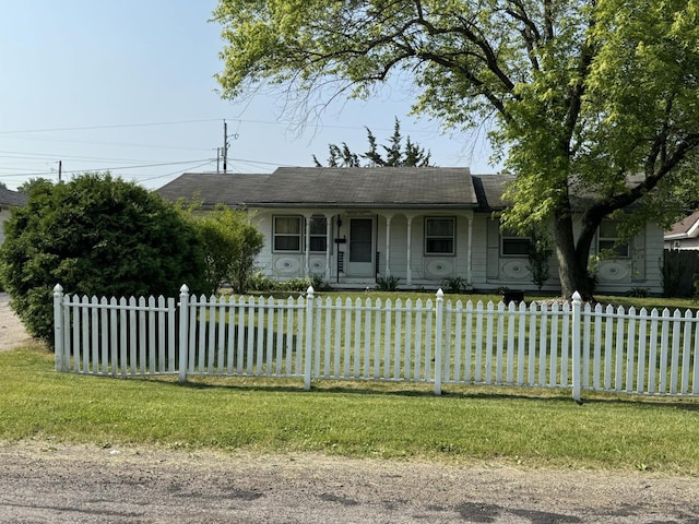 2456 Kurt Rd, Benton Harbor, MI 49022 - ranch-style house with covered porch, a fenced front yard, and roof with shingles