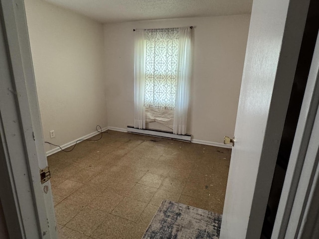 2456 Kurt Rd, Benton Harbor, MI 49022 - empty room with a baseboard radiator and tile patterned floors
