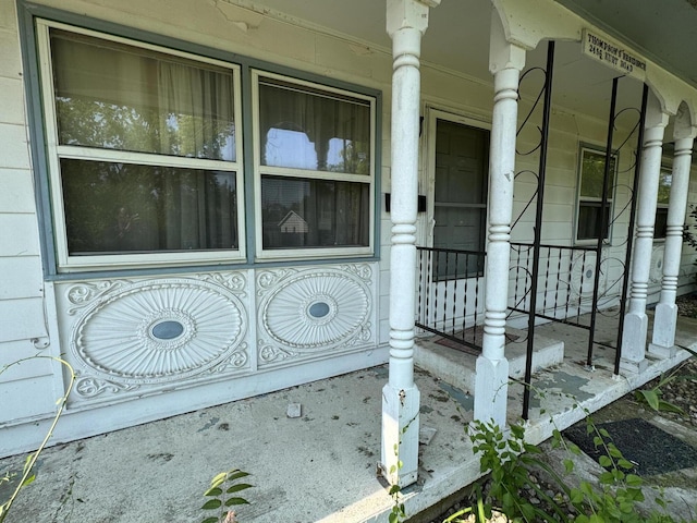 2456 Kurt Rd, Benton Harbor, MI 49022 - doorway to property featuring covered porch