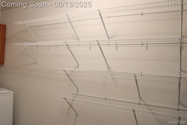 23413 Williamsburg Cir Unit 12, Woodhaven, MI 48183 - walk in closet with washer / clothes dryer