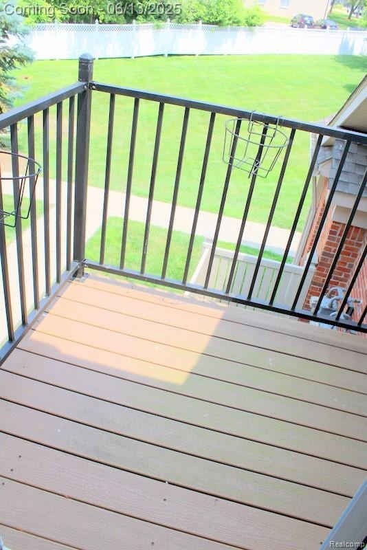 23413 Williamsburg Cir Unit 12, Woodhaven, MI 48183 - wooden deck with a yard