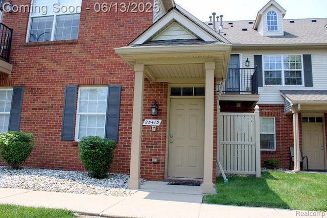23413 Williamsburg Cir Unit 12, Woodhaven, MI 48183 - entrance to property featuring brick siding