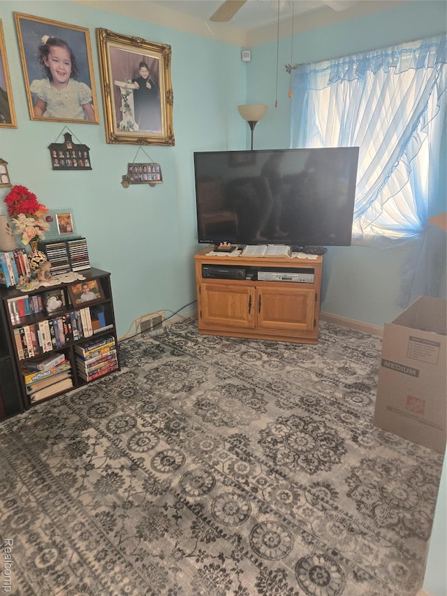 22612 Lyndon St, Detroit, MI 48223 - living area with a ceiling fan