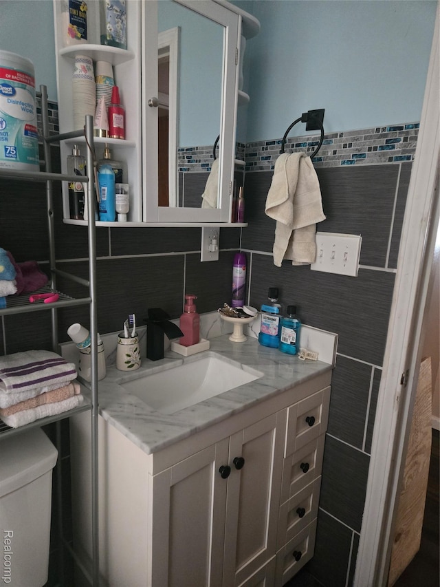 22612 Lyndon St, Detroit, MI 48223 - bathroom featuring vanity and decorative backsplash