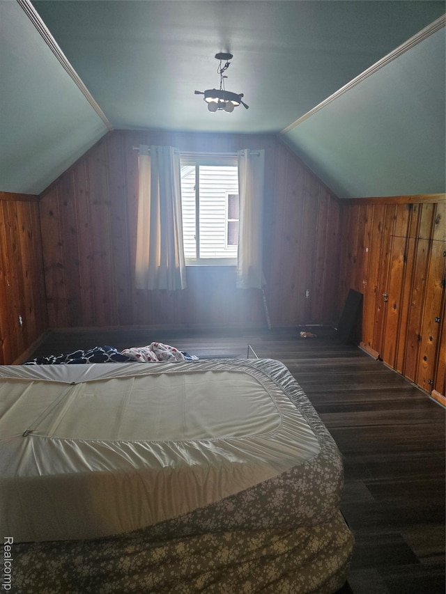 22612 Lyndon St, Detroit, MI 48223 - additional living space with wood finished floors, vaulted ceiling, and wood walls
